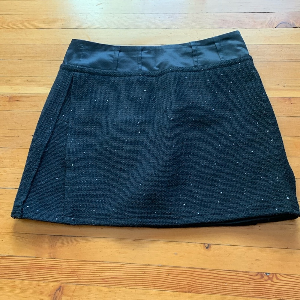Black woven mini skirt with miniature sequins and silky top
